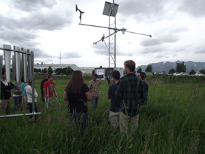 The iFellows cohort visits an iUTAH climate station in Logan, UT with Field Technician, Chris Cox.