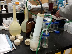 Apparatus to test the 2in diameter lysimeter for accuracy by putting the lysimeter in a premade solution of citric acid, phosphorus, and nitrogen and comparing the results to the known solution concentrations.